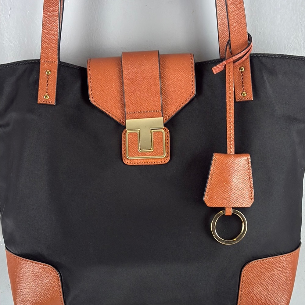 Tory Burch Black and Orange Tote Bag with Structured Design